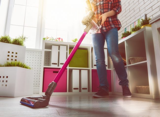 Best Cordless Stick Vacuum review - lady