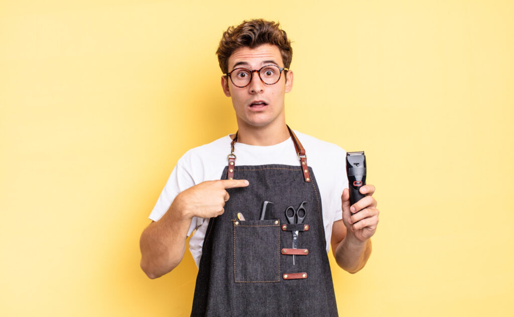 A man holding a clipper representing the best Wahl clippers