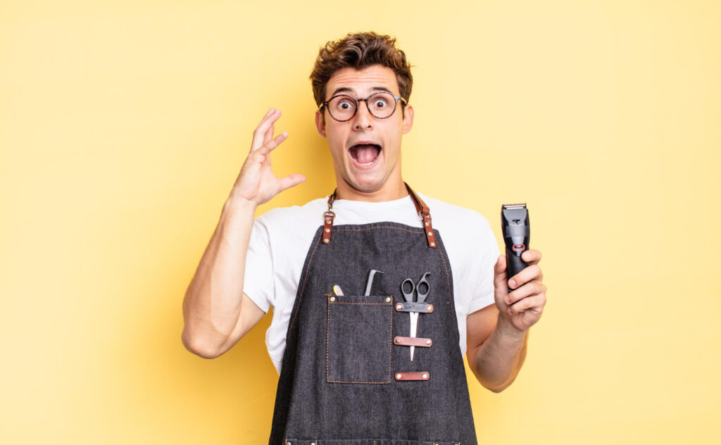 Man holding Best Andis Clippers in his hand