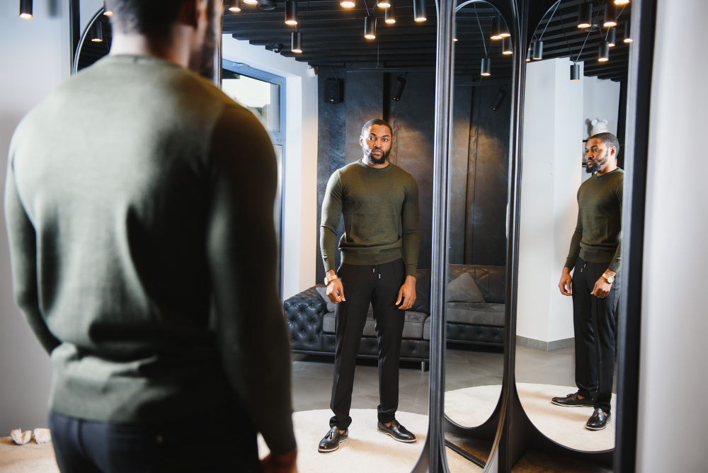 A Man Using Three-way Mirror